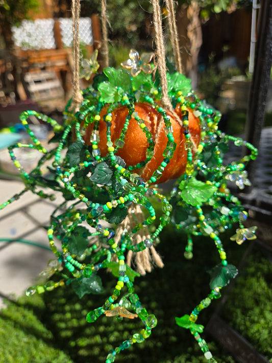 Orange pumpkin vine suncatcher